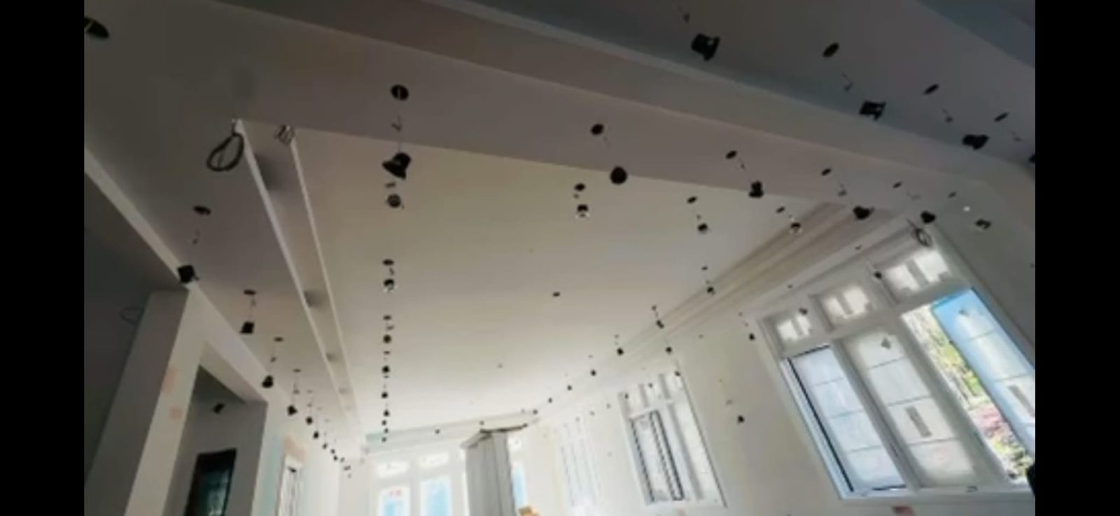 Ceiling during installation with recessed downlight housings fitted